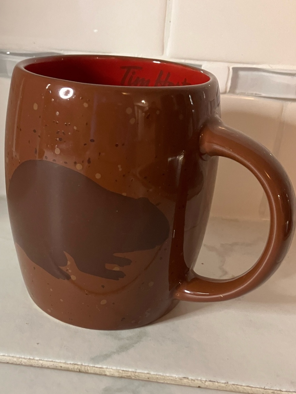 Tim Hortons Brown Ceramic Mug with Red Interior. Beaver print